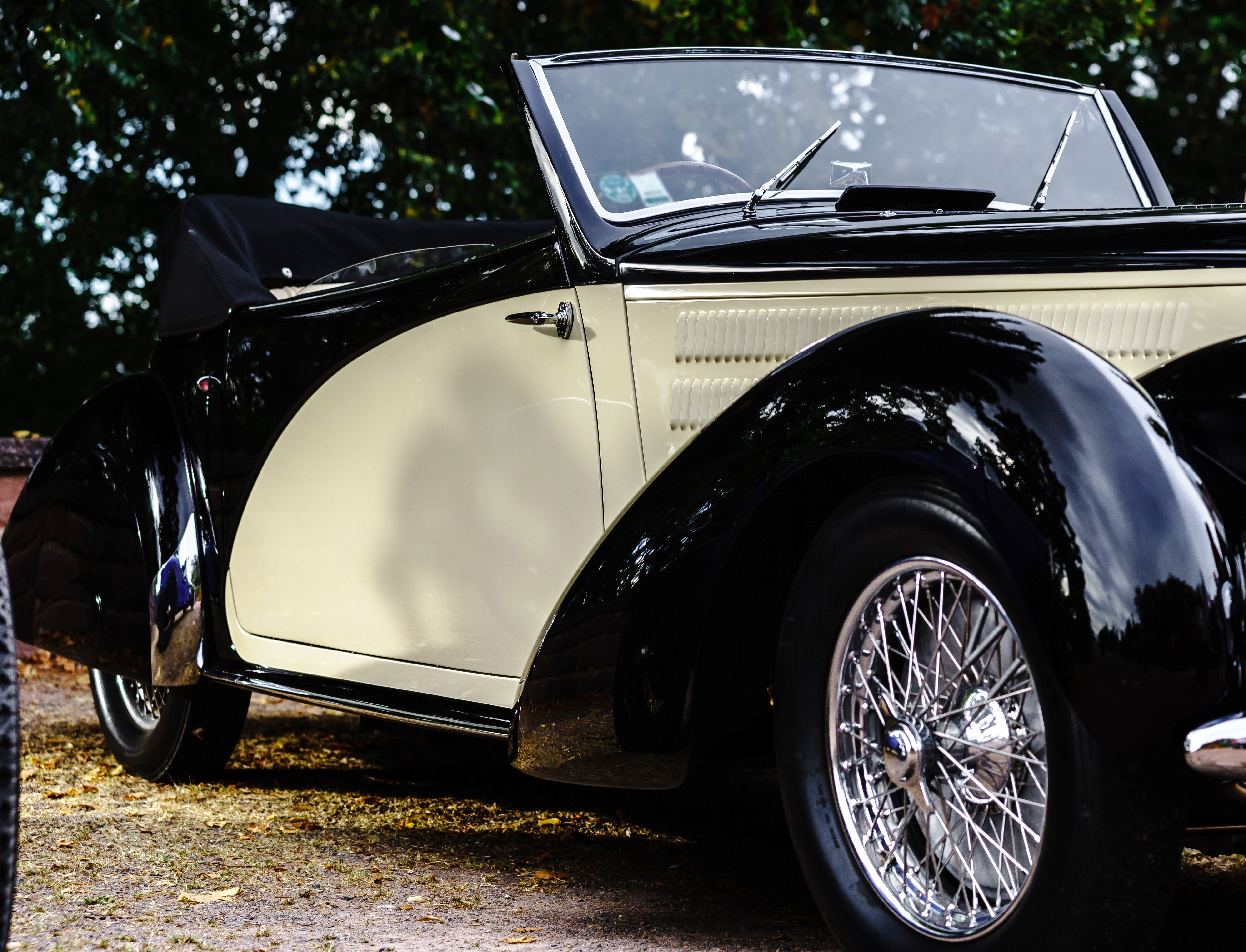 Beautiful retro car. Elegance and style of first part of XX century. Vintage luxury cars